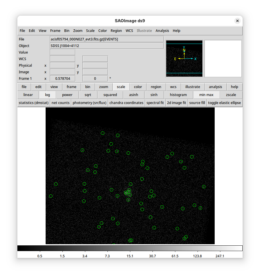 [The DS9 window displaying a portion of the event file for this observation, along with circles marking the sources found in the Chandra Source Catalog.]